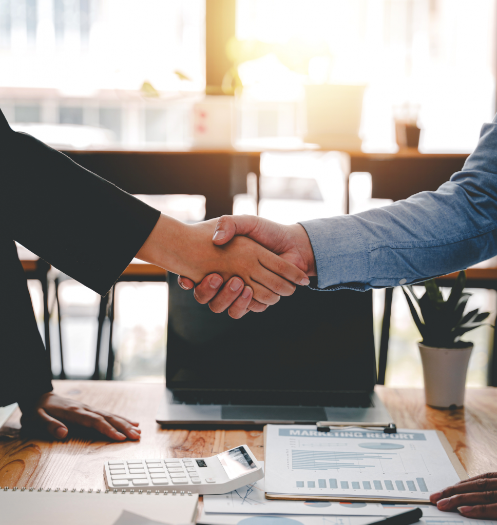 Virginia Postal Service Board of Contract Appeals Attorney shakes hand with client over desk